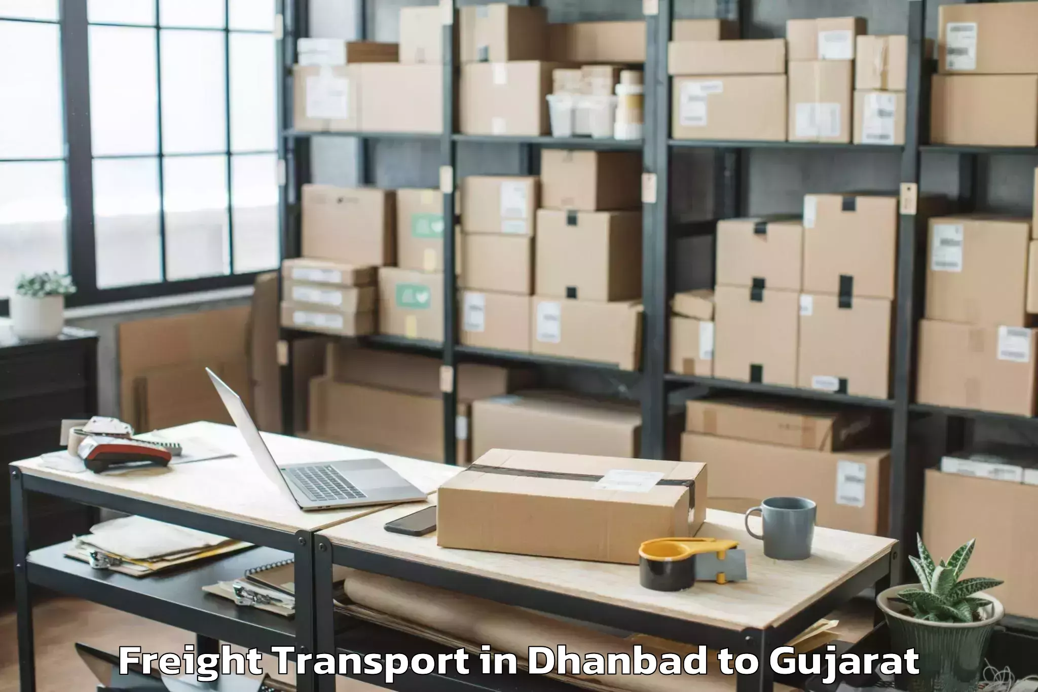 Book Dhanbad to Kadi Freight Transport Online